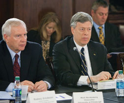 Pitt Chancellor Mark A. Nordenberg (right) and Penn State President Rodney Erickson listen intently during a Feb. 22 hearing on proposed budget cuts for higher education, held before the Pennsylvania House of Representatives  Appropriations Committee in Harrisburg. Temple University and Lincoln University presidents Ann Weaver Hart and Robert Jennings, respectively, also testified during the hearing on the proposed funding cuts for Pitt, Penn State, and Temple. Gov. Tom Corbett has proposed no change in Lincoln’s state funding for 2012-13.