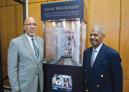 Woodruff-Display#2 From left, Woodruff Jr. and Hill flank the interactive display.