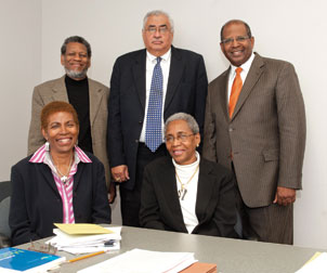 NEGRO EDUCATIONAL REVIEW: Alice M. Scales and Shirley A. Biggs (seated, from left), Pitt professors of education emerita, met with officials from Florida A&M University (FAMU) to discuss issues related to the Negro Educational Review. The international refereed journal was established in 1950 and has been edited by Scales, editor-in-chief and comanaging editor, and Biggs, comanaging editor, at Pitt since 2005. The women met Oct. 18 in Posvar Hall with (standing, from left) FAMU officials Franklin D. Hamilton (GSPH ’69), professor emeritus, Environmental Sciences Institute; Frederick S. Humphries (A&S ’65), Regent Professor, FAMU College of Law; and James E. Hawkins, advisory editor of the Negro Educational Review and dean, School of Journalism & Graphic Communication.