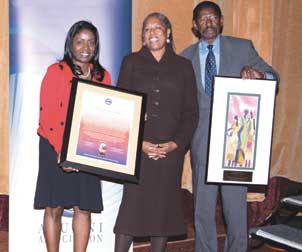 Wharton Boyd (left), stands with Gail Austin, former director of Pitt’s Academic Resource Center, and Ludwick “Luddy” Hayden Jr. (A&S ’66, EDUC ’68G), a former AAAC Distinguished African American Alumni Award winner and the president and founder of the consulting firm Luddy Hayden and Associates. Austin received the special Sankofa Jean Hamilton Walls Award during AAAC’s 2010 Sankofa Homecoming weekend.  