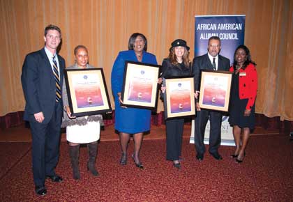 Jeff Gleim (far left), Pitt’s associate vice chancellor for alumni relations and executive director of the Pitt Alumni Association, and Wharton-Boyd (far right) stand with (from left) individual Sankofa awardees Deborah Walker, student conduct officer in Pitt’s Division of Student Affairs; Linda Williams Moore, director of Pitt’s Office of Cross Cultural and Leadership Development; RaShall Brackney, commander in the City of Pittsburgh Bureau of Police; and James Cox, director of Pitt’s University Counseling Center.