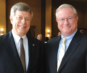 chancellor-at-duquesne Pitt Chancellor Mark A. Nordenberg (left) paid tribute to the late Ralph Cappy, former chair of Pitt’s Board of Trustees and retired Chief Justice of Pennsylvania, during a Sept. 15 program at Duquesne University. Justices of the state Supreme Court gathered at Duquesne and went into special session for the unveiling of an official portrait of Cappy, who died May 1. The program was hosted by Interim Dean and Pitt alumnus Kenneth Gormley (A&S ’77) of the Duquesne School of Law and the Duquesne Law Review. Nordenberg was the second speaker for the event, preceded by Cappy’s successor as chief justice, Ronald D. Castille. Above, Nordenberg stands with Duquesne University President Charles J. Dougherty.