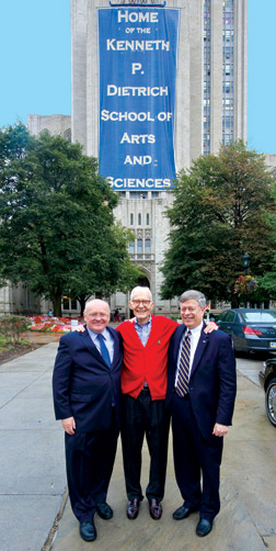 From left, N. John Cooper, the Bettye J. and Ralph E. Bailey Dean of Arts and Sciences at Pitt; William S. Dietrich II, highly respected business leader, philanthropist, and Pitt alumnus, Trustee, and former Board chairperson; and Chancellor Mark A. Nordenberg. The 100-foot-by-48-foot banner behind them was unfurled Sept. 23 from the fifth to 16th floors of the Cathedral of Learning’s Fifth Avenue elevation. 