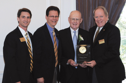 From left: Jeff Gleim, executive director, Pitt Alumni Association, and associate vice chancellor for alumni relations; Al Novak, vice chancellor for institutional advancement; J. Roger Glunt, past president and director emeritus of the Pitt Alumni Association receiving the Bill Baierl Distinguished Service Award; and F. James McCarl III, president of the Pitt Alumni Association. 