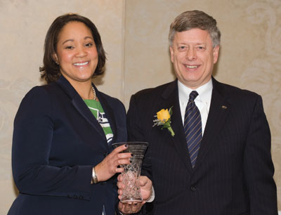 The Homer S. Brown Law Association honored Chancellor Mark A. Nordenberg with the 2009 Spirit Award during a Feb. 26 dinner at the Rivers Club, Downtown. Presenting the glass award is Nicole King (A&S ‘02, LAW ‘05), association president and a staff attorney and assistant corporate secretary for EQT Corporation. The Homer S. Brown Law Association, an affiliate of the National Bar Association, is a professional organization with 200 African American attorneys and jurists.