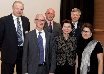 PALLADIO'S LEGACY: Chancellor Mark A. Nordenberg, the Honorary British Consul in Pittsburgh, hosted a Sept. 19 reception and lecture to celebrate the opening of the Carnegie Museum of Art exhibition Palladio and His Legacy: A Transatlantic Journey. Andrea Palladio (1509-1580) was one of the most influential architects in the Western world. A number of his drawings, books, and models are held in a collection owned by the Royal Institute of British Architects (RIBA), which organized the traveling exhibition. In the front row, from left, are Harry Rich, the RIBA’s chief executive; Irena Murray, director of the RIBA Sir Bannister Fletcher Library; and Tracy Myers, curator of architecture and curatorial liaison for exhibitions at the Heinz Architectural Center in the Carnegie Museum of Art. In the back row, from left, are Stephen Phillips, chair, British Architectural Trust; Charles Hind, associate director and H. J. Heinz Curator of the Drawings and Archives Collection at the RIBA; and Chancellor Nordenberg. The reception was held in the Connolly Ballroom, Alumni Hall.