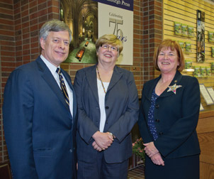 PITT PRESS 75TH ANNIVERSARY: From left, Pitt Chancellor Mark A. Nordenberg; Cynthia Miller, director of the University of Pittsburgh Press; and Pitt Provost and Senior Vice Chancellor Patricia E. Beeson are pictured during a reception celebrating 75 years of the University of Pittsburgh Press. The Sept. 28 event was held in The Book Center. The Press was founded in 1936 with funding from the A. W. Mellon Educational and Charitable Trust, the Buhl Foundation, the Historical Society of Western Pennsylvania, and the University of Pittsburgh.