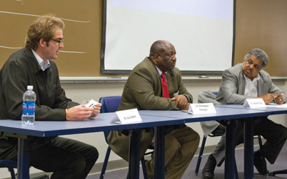 'SILENT NO MORE': Pitt hosted an international conference titled “Silent No More: Rape as a Weapon of Political Violence” on Sept. 17-20 in Posvar Hall. The event focused on Zimbabwean women and girls who, while rarely called upon to physically fight in the country’s internal or external conflicts, suffer as victims of politically motivated sexual violence. Participating in one of the conference’s panels were (from left) Alan Martin, research director, Partnership Africa Canada; Christopher Kwangwari, a clinical specialty pharmacist who teaches at Florida Keys Community College; and Jerome Taylor, chair and a professor of Africana Studies at Pitt.